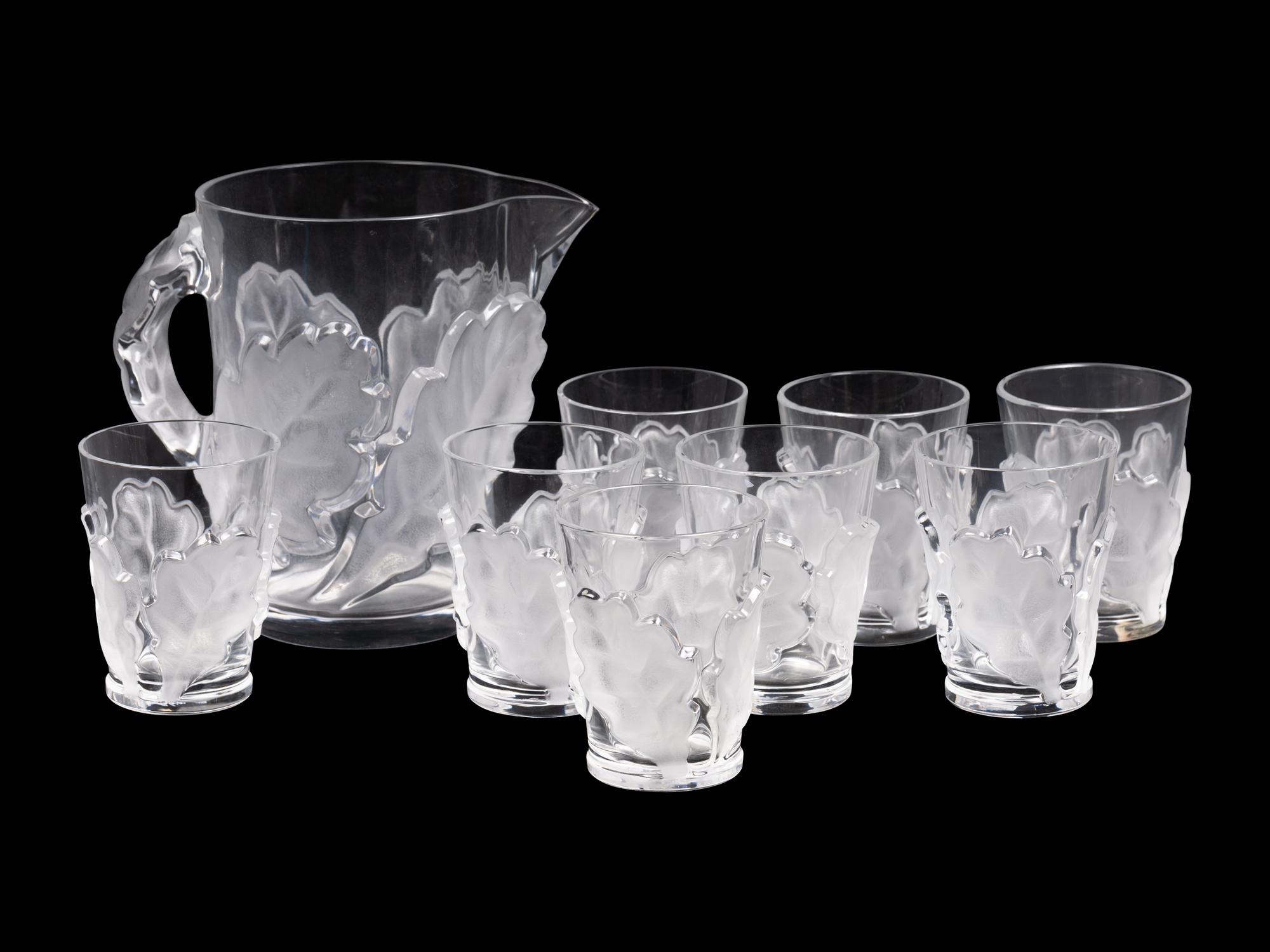 A Lalique Chene Pitcher and Eight Glasses