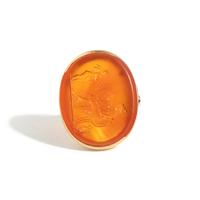 A Neoclassical Gold and Carnelian Finger Ring with a Muse Playing a Harp