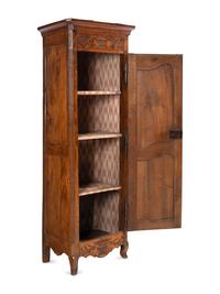 A Louis XV Provincial Walnut Cabinet