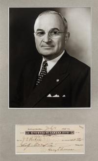 TRUMAN, HARRY. Signed check; framed with black and white photograph.