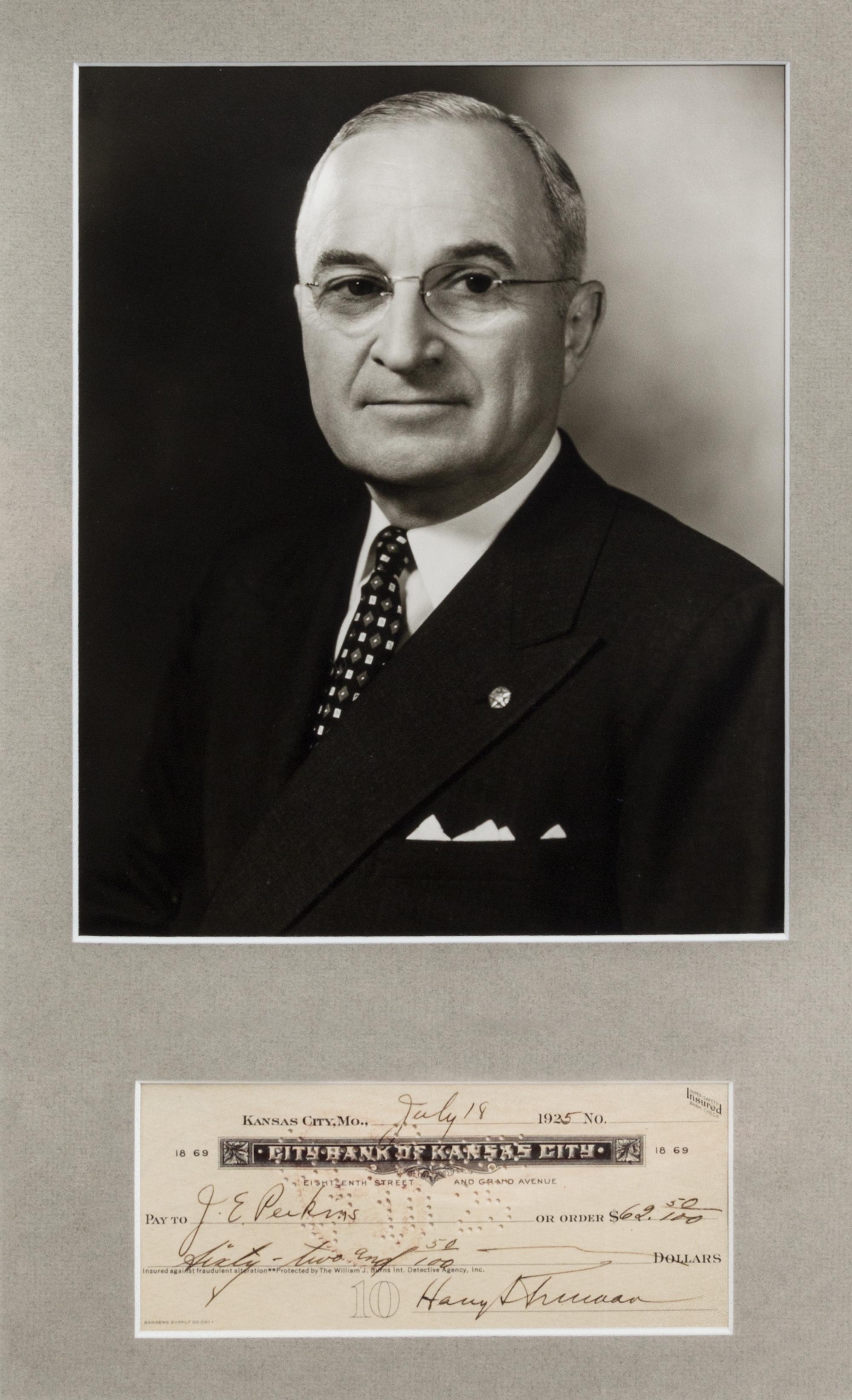 TRUMAN, HARRY. Signed check; framed with black and white photograph.