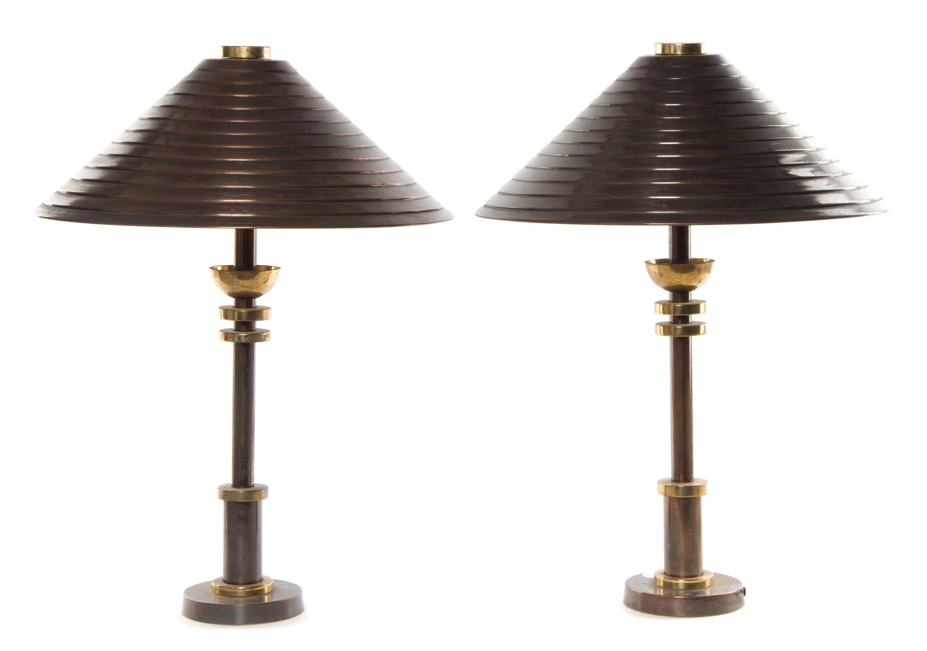 A Pair of Modernist Brass Table Lamps Height 21 inches.