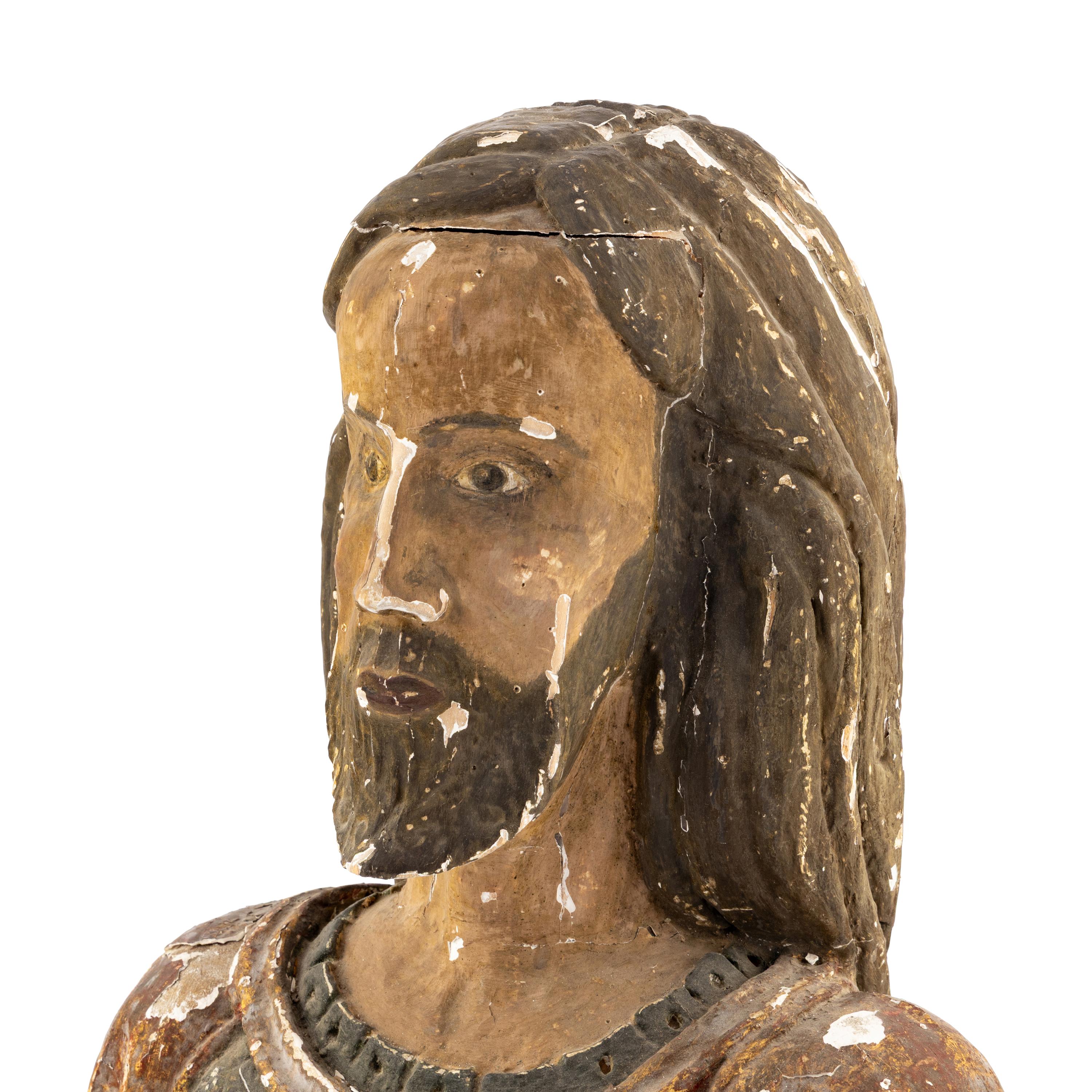 A Spanish Carved Wood and Polychrome Decorated Reliquary Bust