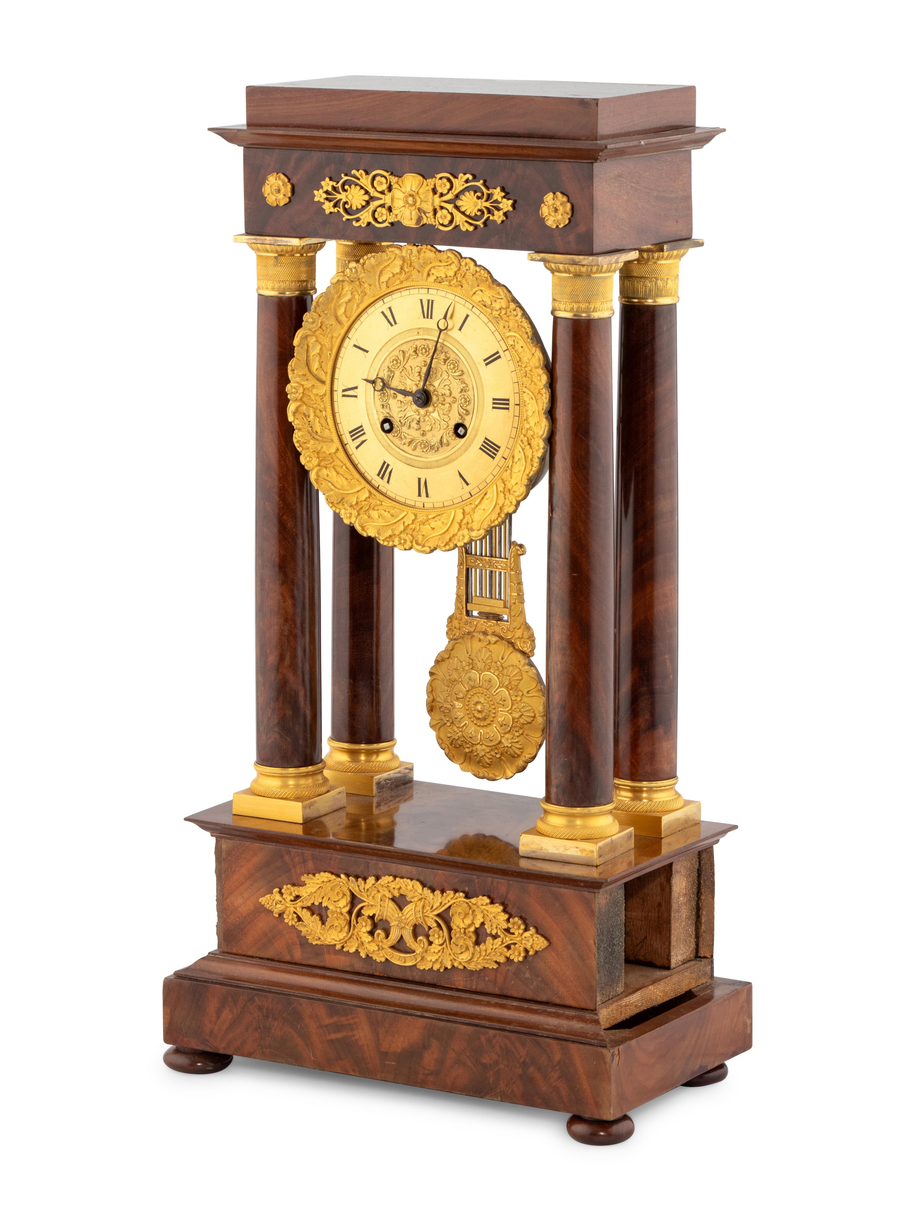 A Charles X Gilt-Bronze Mounted Portico Clock