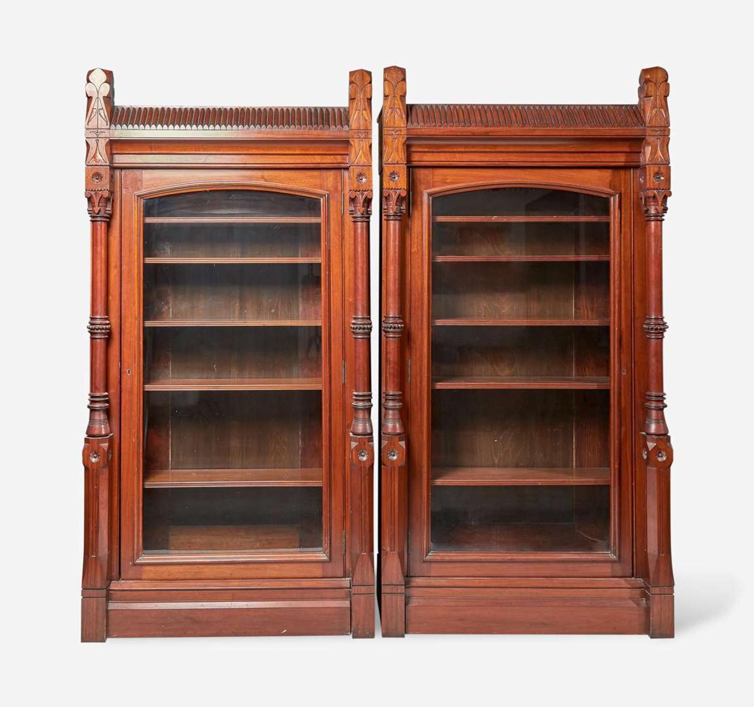 A glazed walnut double bookcase Attributed to Frank Furness (American, 1839-1912) and Daniel Pabst (American, b. Germany, 1826-1910), USA, circa 1875-1885
