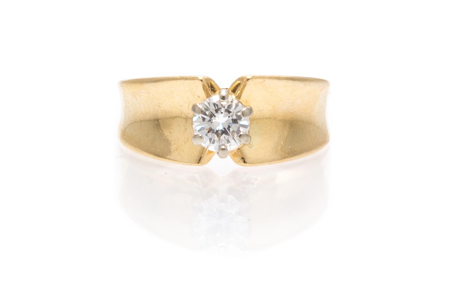 A 14 Karat Yellow Gold and Diamond Ring, 2.80 dwts.