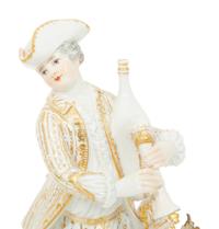 A Pair of Partial Gilt Meissen Porcelain Figures of a Man and Woman