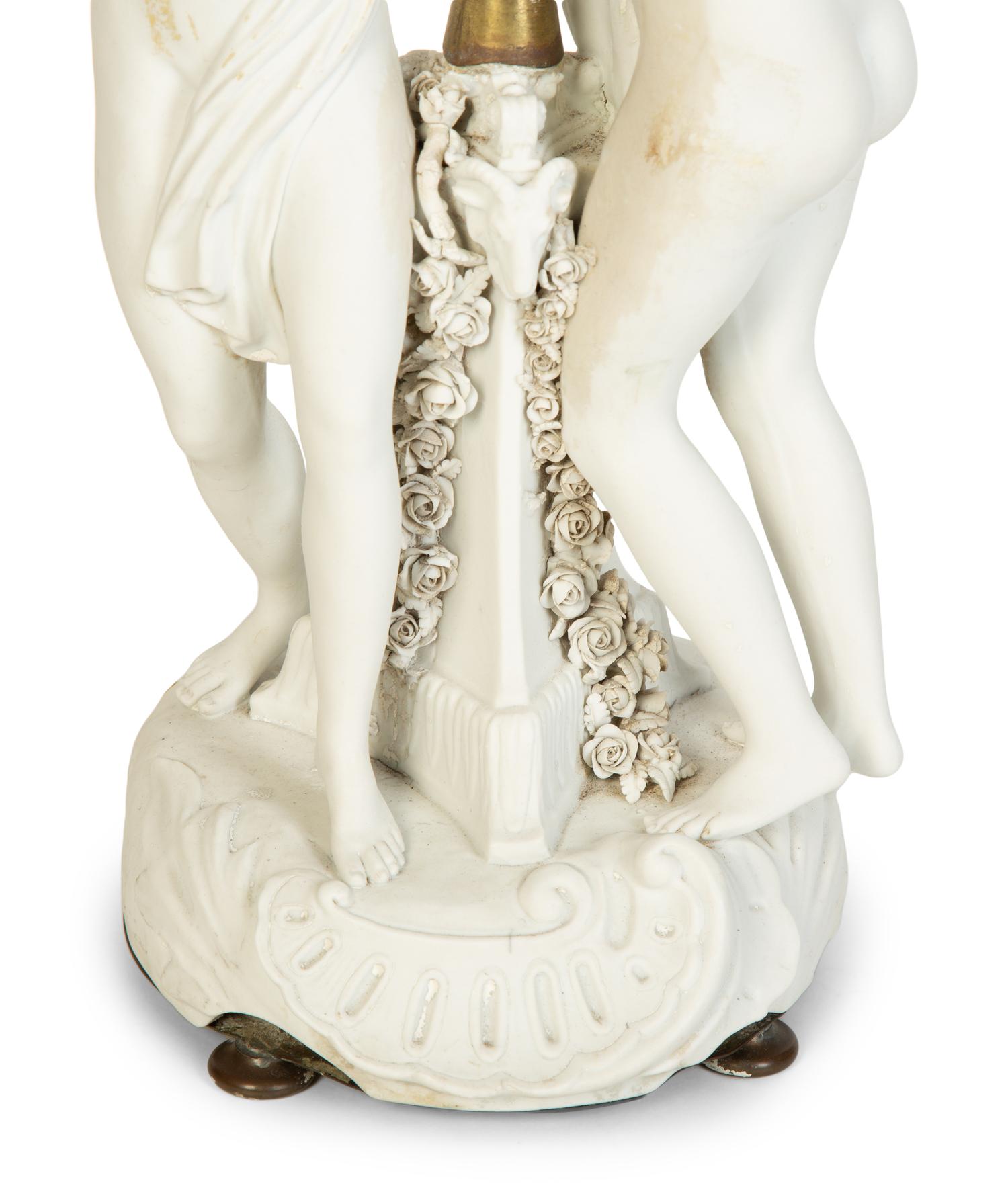 A Gilt Bronze Mounted Bisque Porcelain Candelabrum