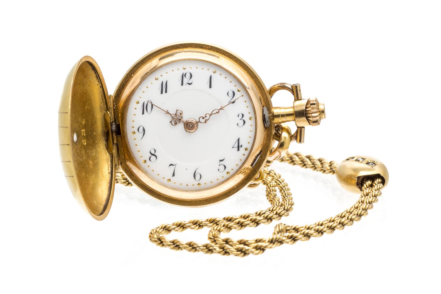 A 14 Karat Yellow Gold and Diamond Hunter Case Pendant Watch, 22.90 dwts.
