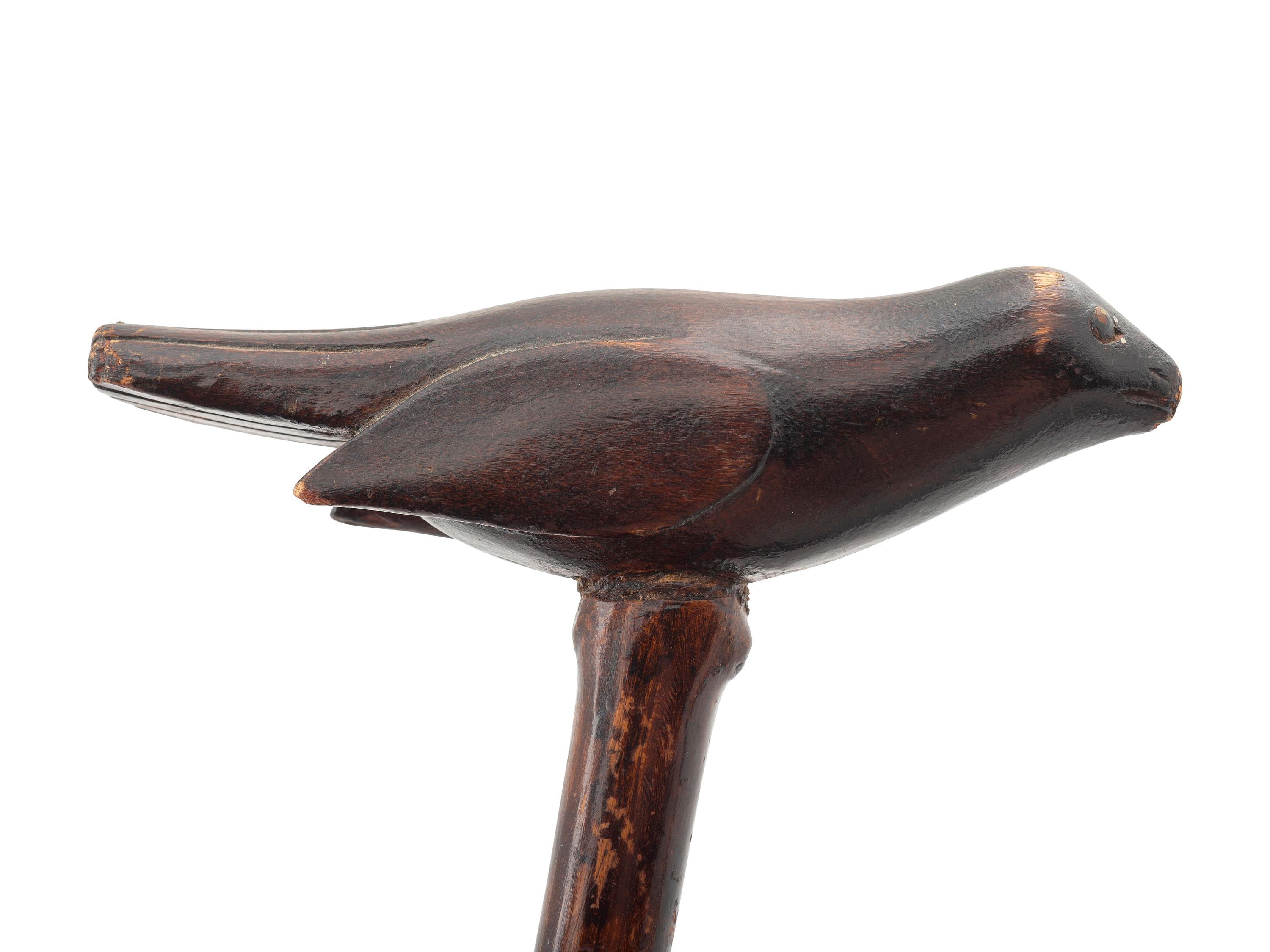 A Folk Art Carved Wood Bird and Serpent Cane