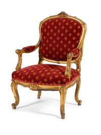 A Louis XV Style Carved Giltwood Fauteuil — 20TH CENTURY