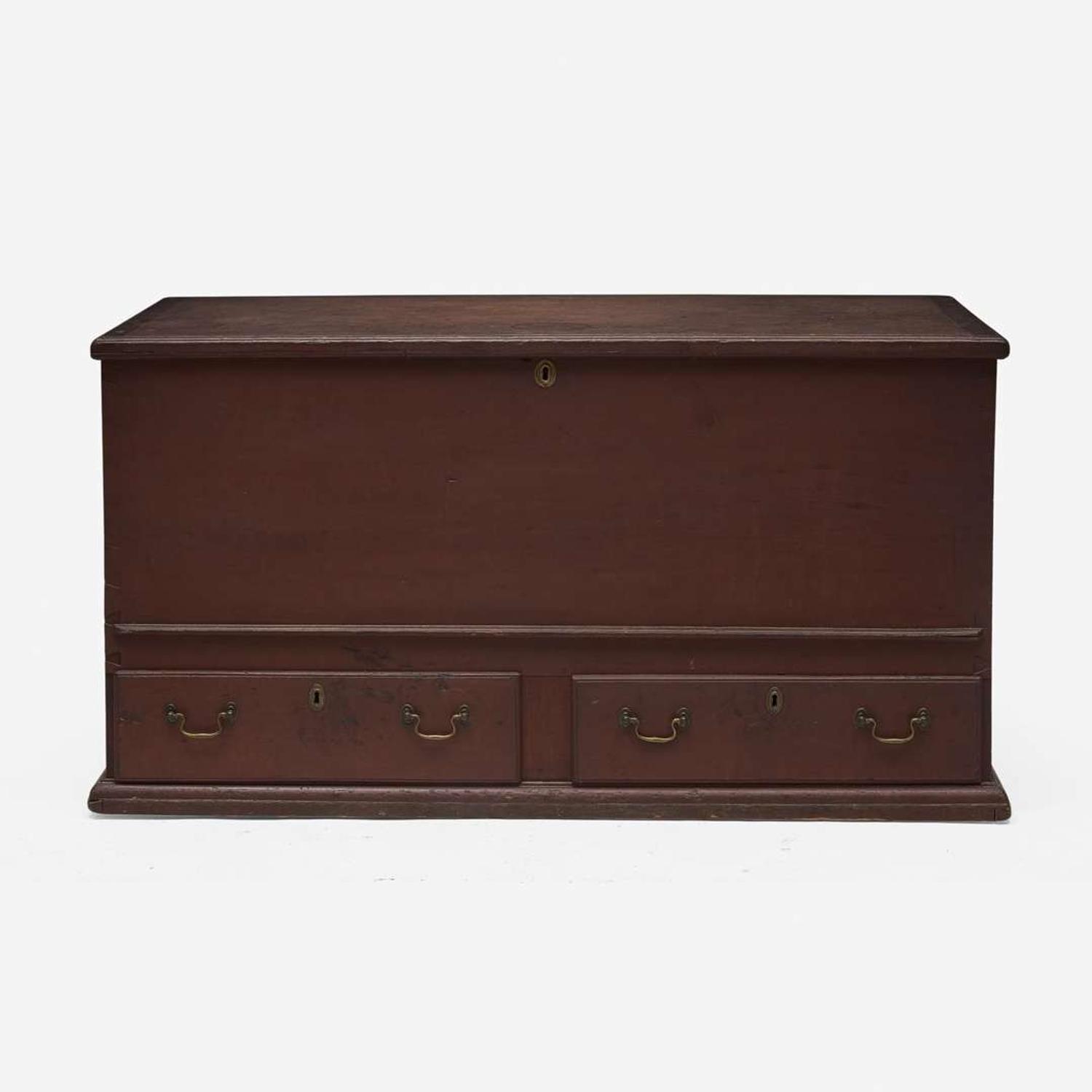 A red-painted blanket chest with Fraktur under lid Northampton County, PA, circa 1800