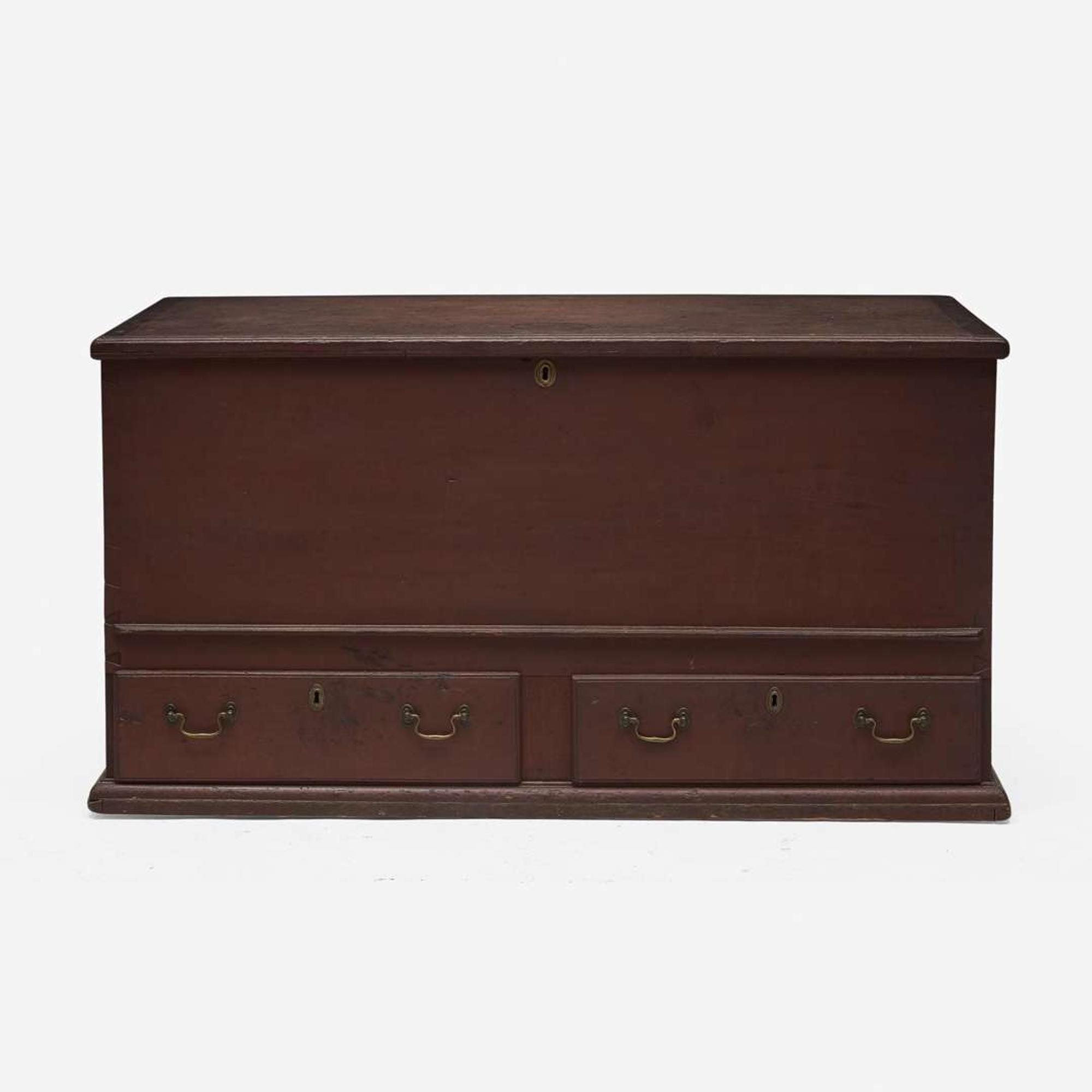 A red-painted blanket chest with Fraktur under lid Northampton County, PA, circa 1800