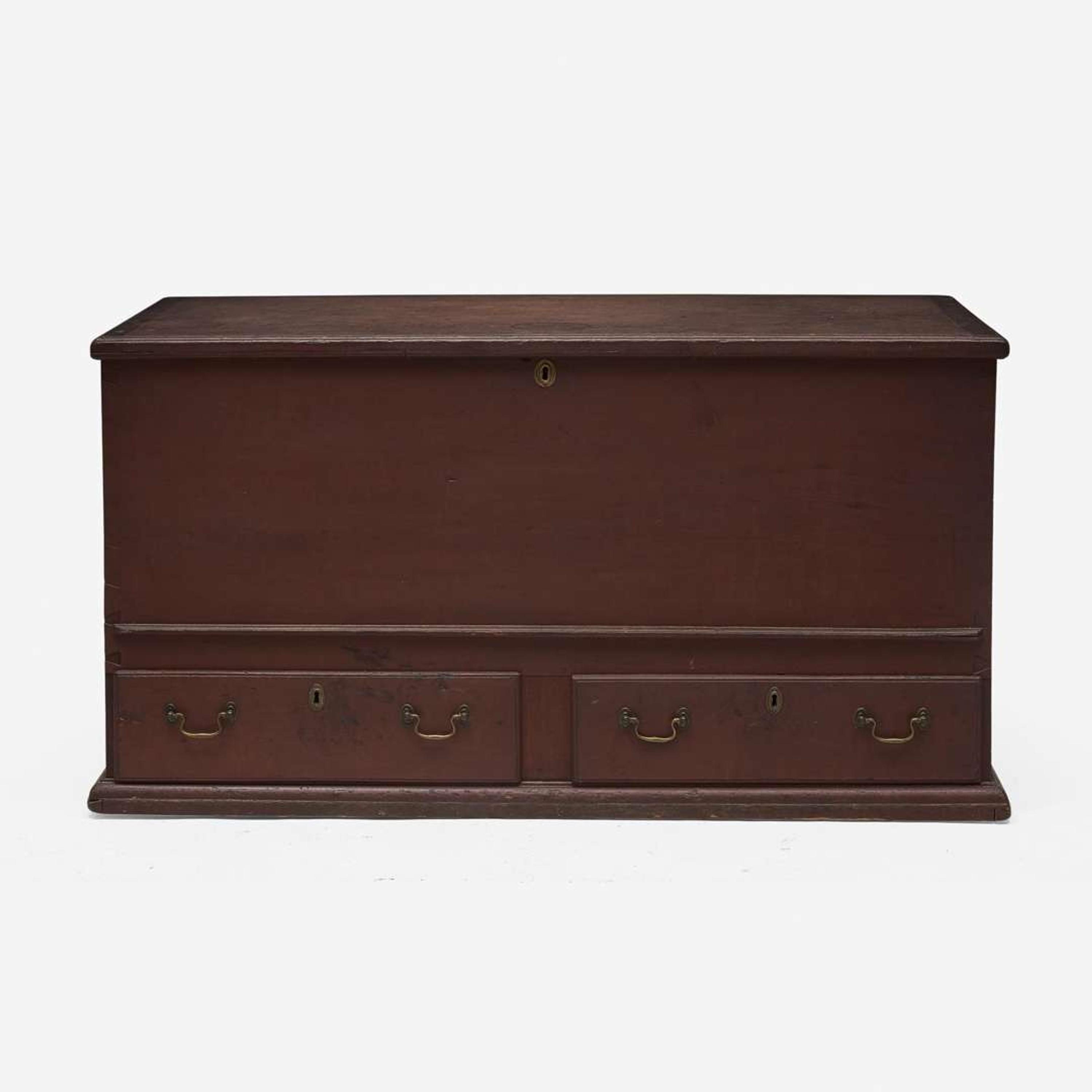 A red-painted blanket chest with Fraktur under lid Northampton County, PA, circa 1800