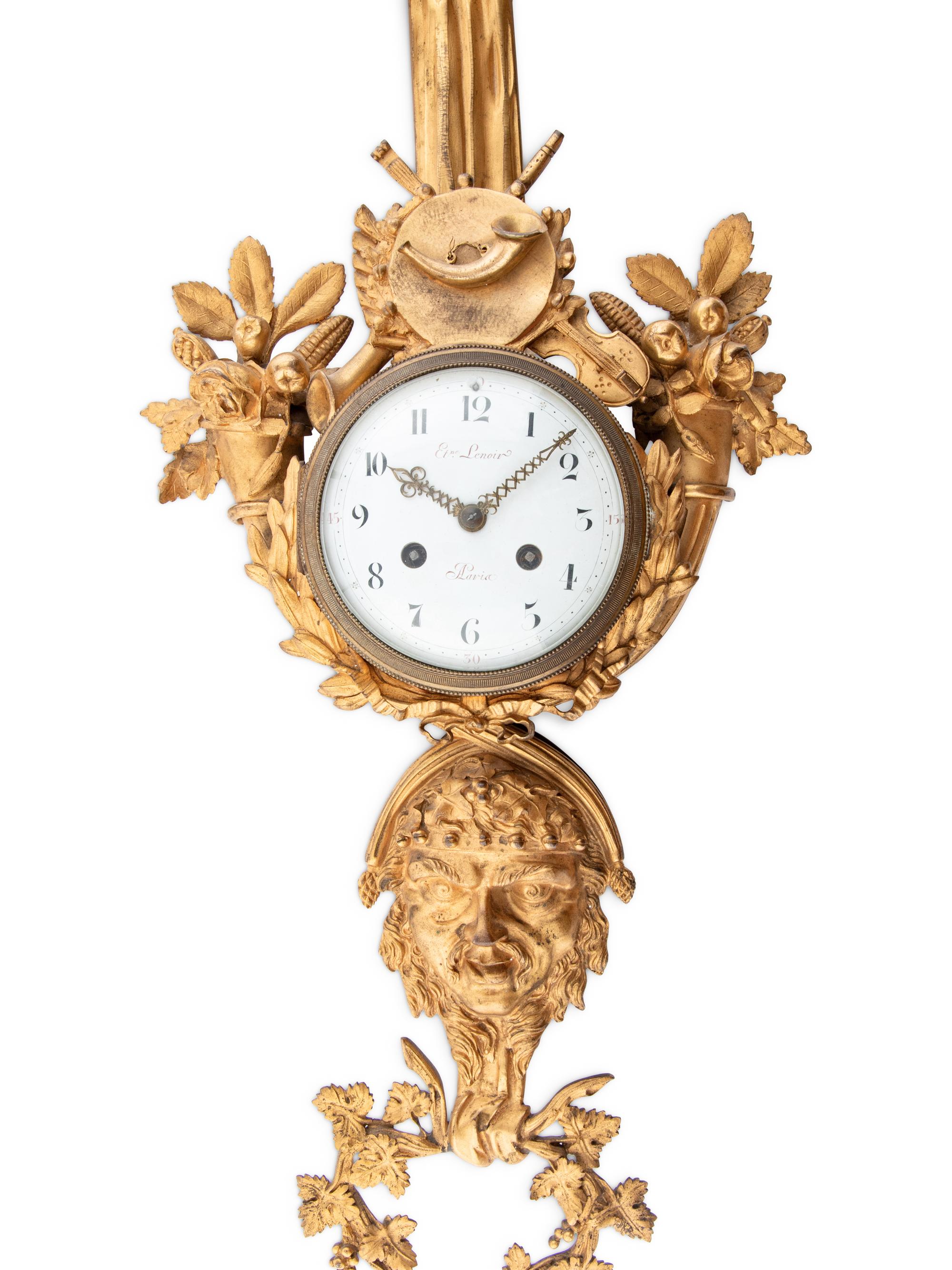 A French Gilt Metal Wall Clock