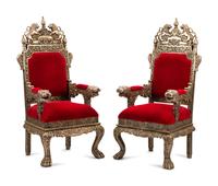 A Pair of Indian Style Silver-Clad Armchairs