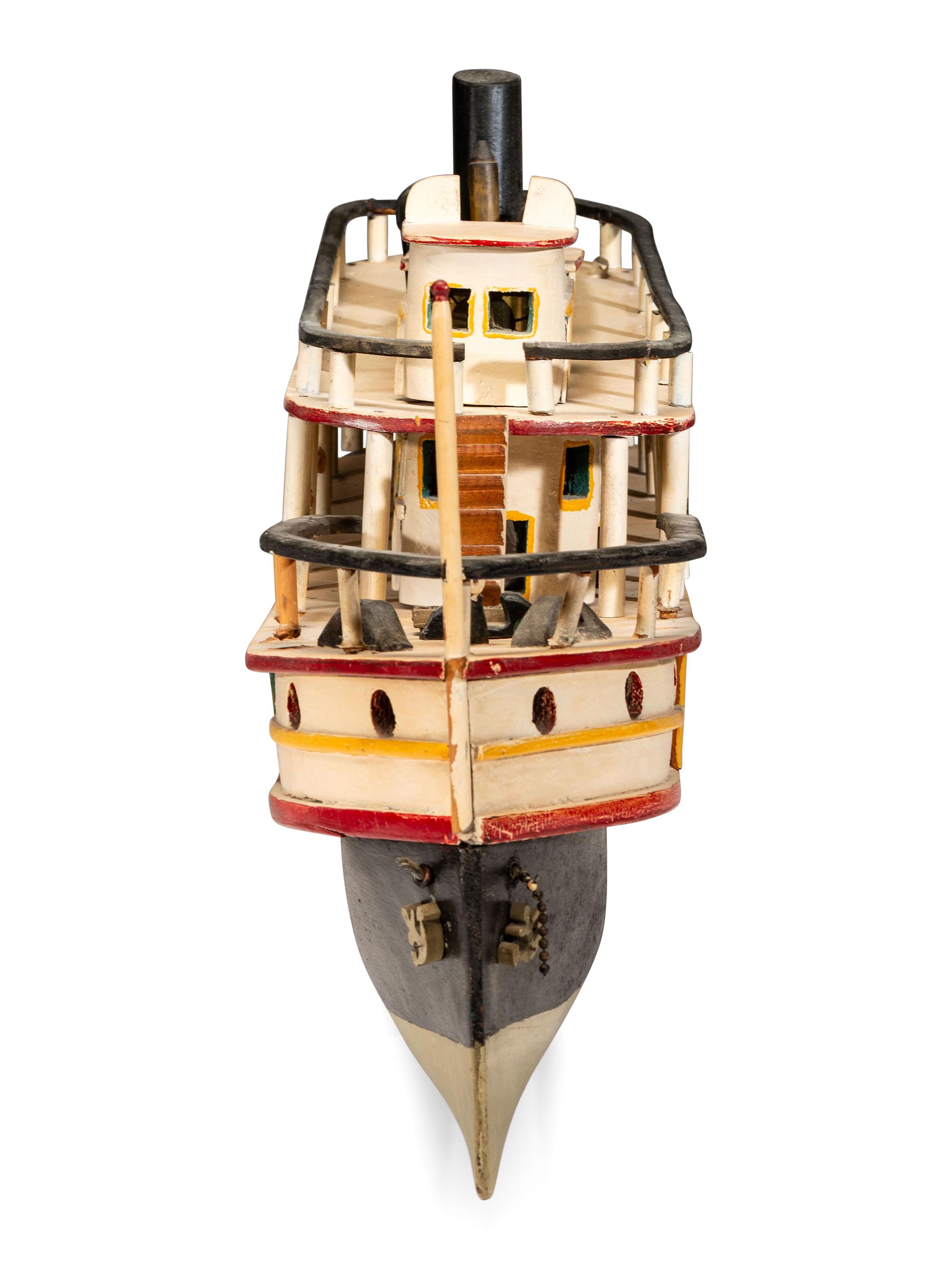 A Carved and Painted Wood Steamboat Model
