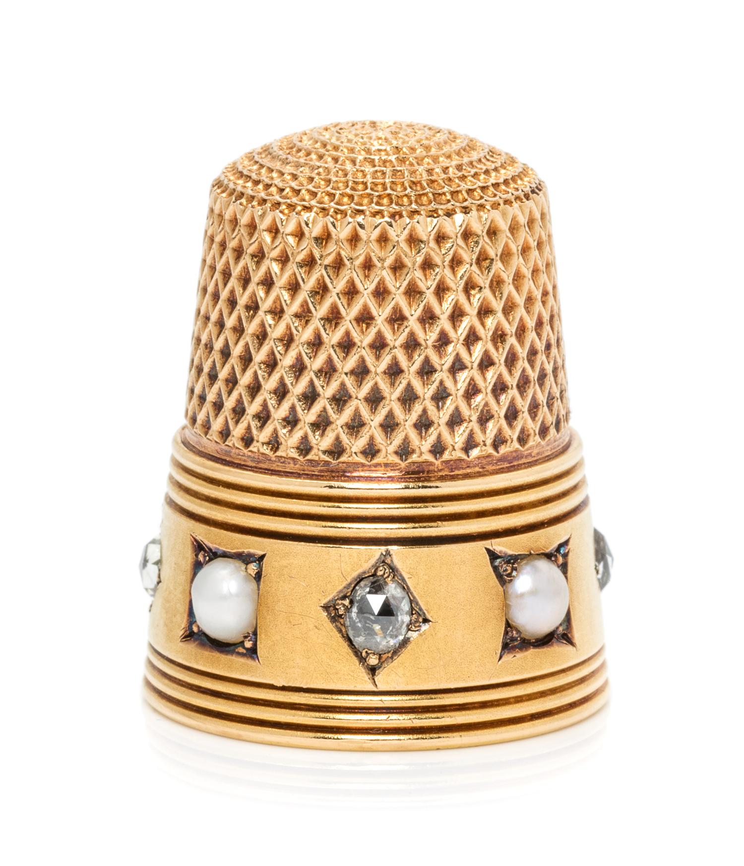 An American 18-Karat Yellow Gold, Diamond and Pearl Thimble, Possibly Tiffany & Co., New York, NY, the knurled top and body above the r
