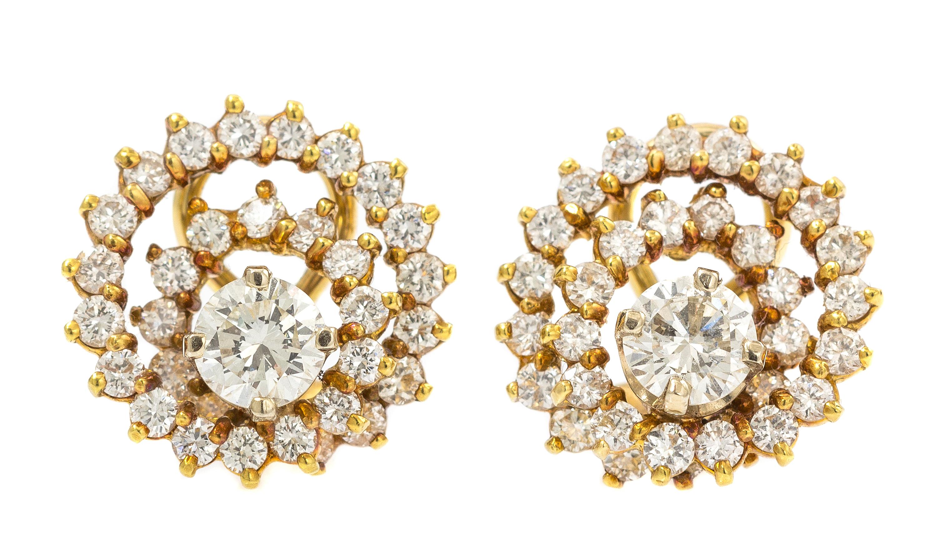 A Pair of 18 Karat Yellow Gold Diamond Swirl Earclips, 5.70 dwts.