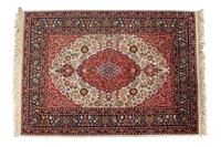 A Hereke Wool Rug 7 feet 3 x 5 feet 5 inches. — 20TH CENTURY