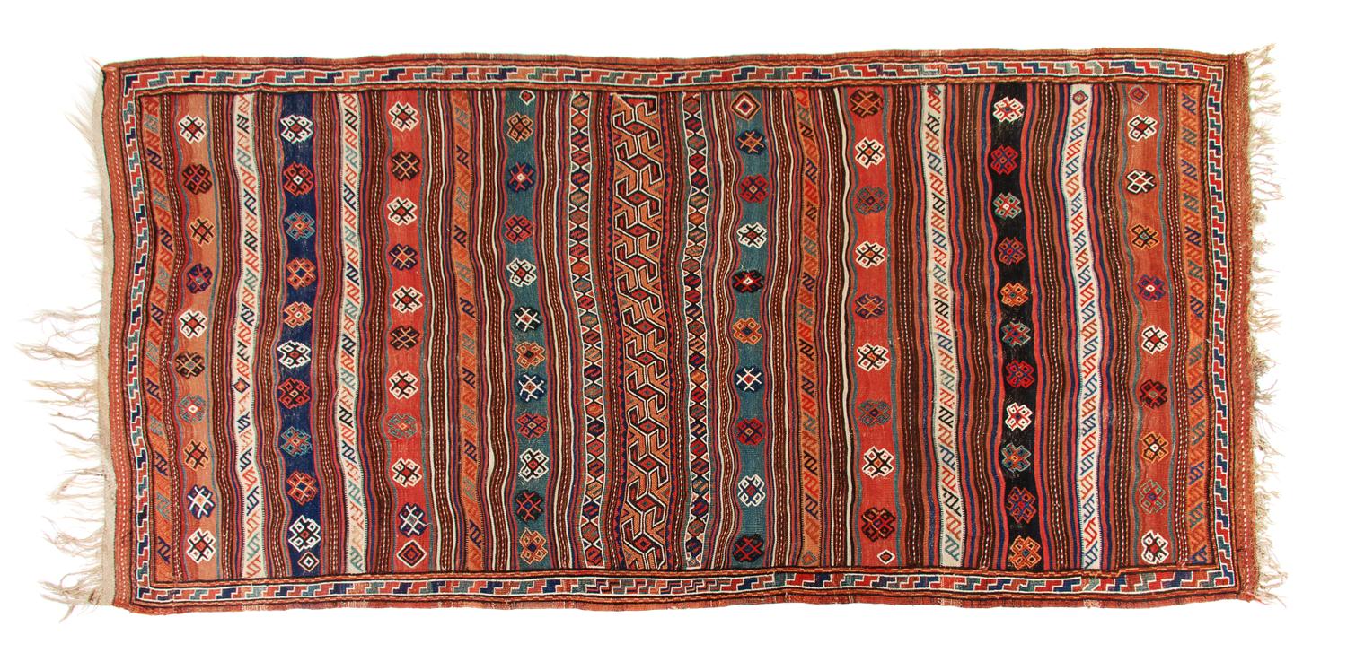A Soumak Wool Rug 11 feet 2 inches x 5 feet 10 inches. — CIRCA 1890