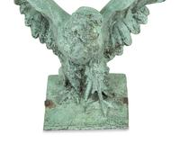 A Patinated Cast Metal Eagle Architectural Ornament with Verdigris Patina