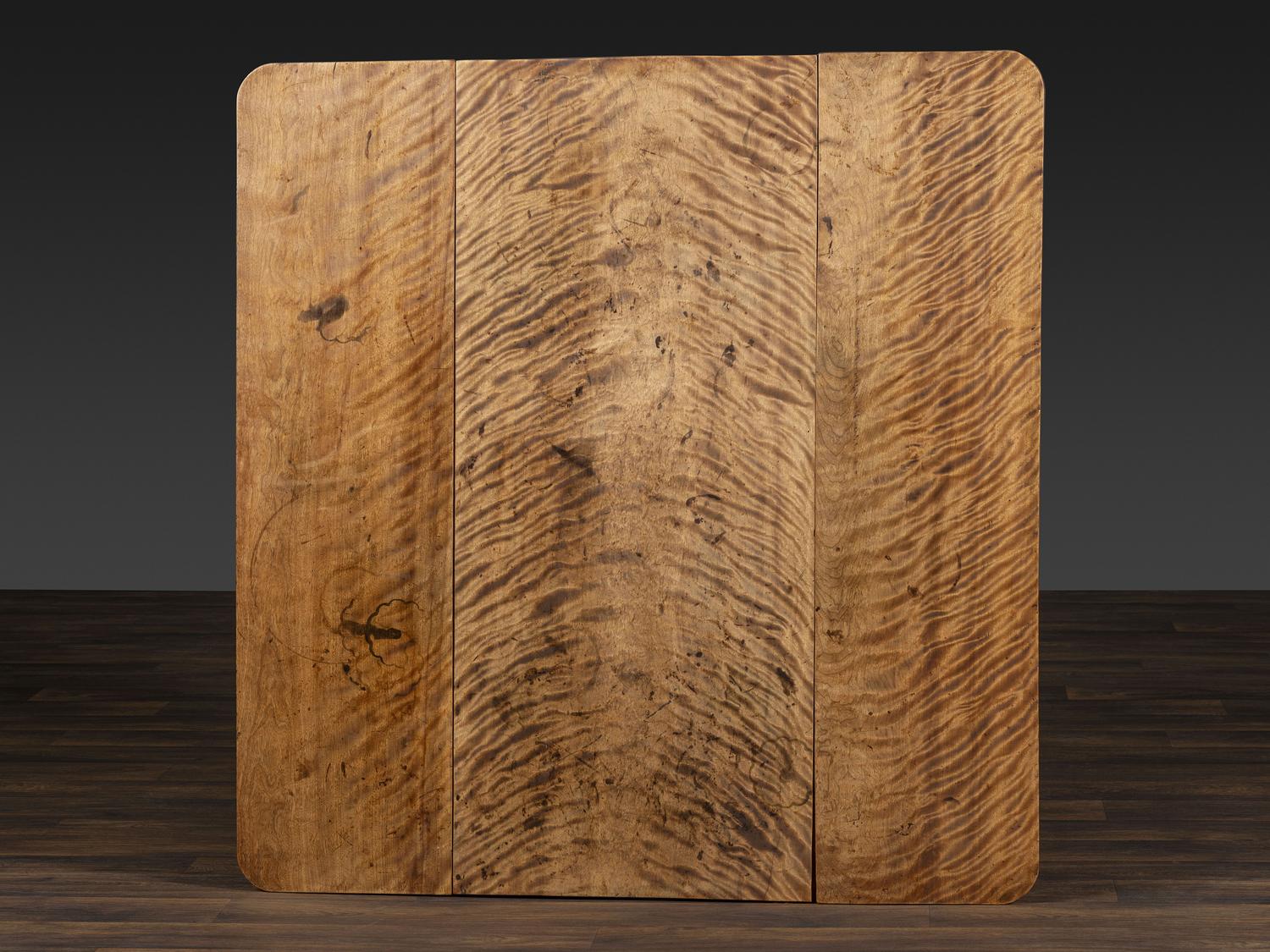 A Late Federal Figured Birch Drop Leaf Dining Table