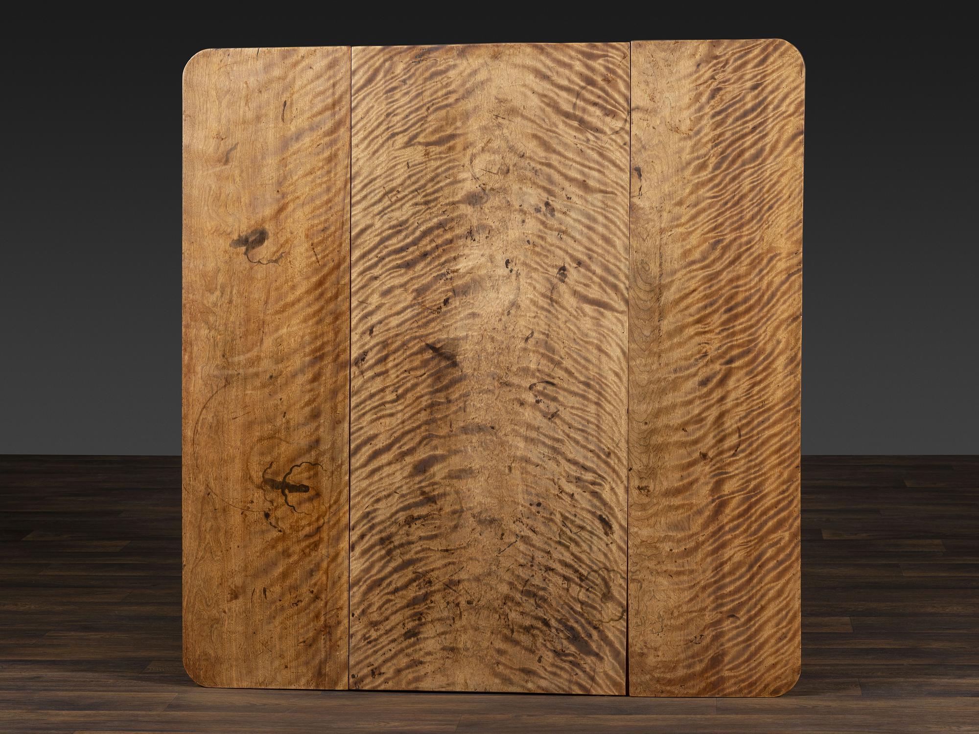 A Late Federal Figured Birch Drop Leaf Dining Table