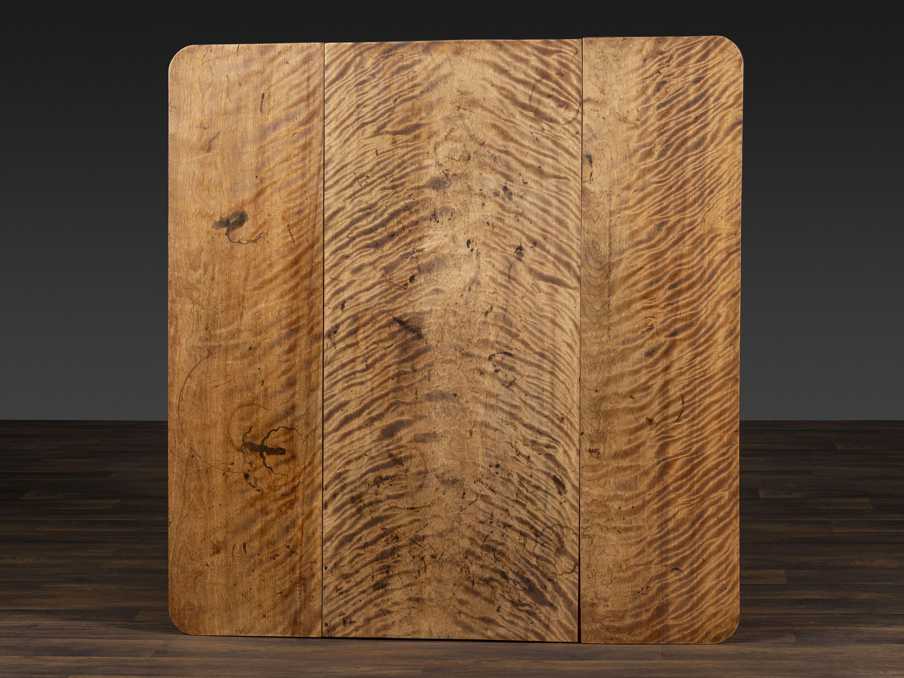 A Late Federal Figured Birch Drop Leaf Dining Table