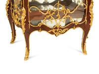 A Pair of Louis XV Style Gilt Bronze Mounted Vitrine Cabinets