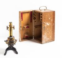A German Brass and Black Lacquered Microscope Height of microscope 11 1/2 inches. — ERNEST LEITZ, WETZLAR, 20TH CENTURY