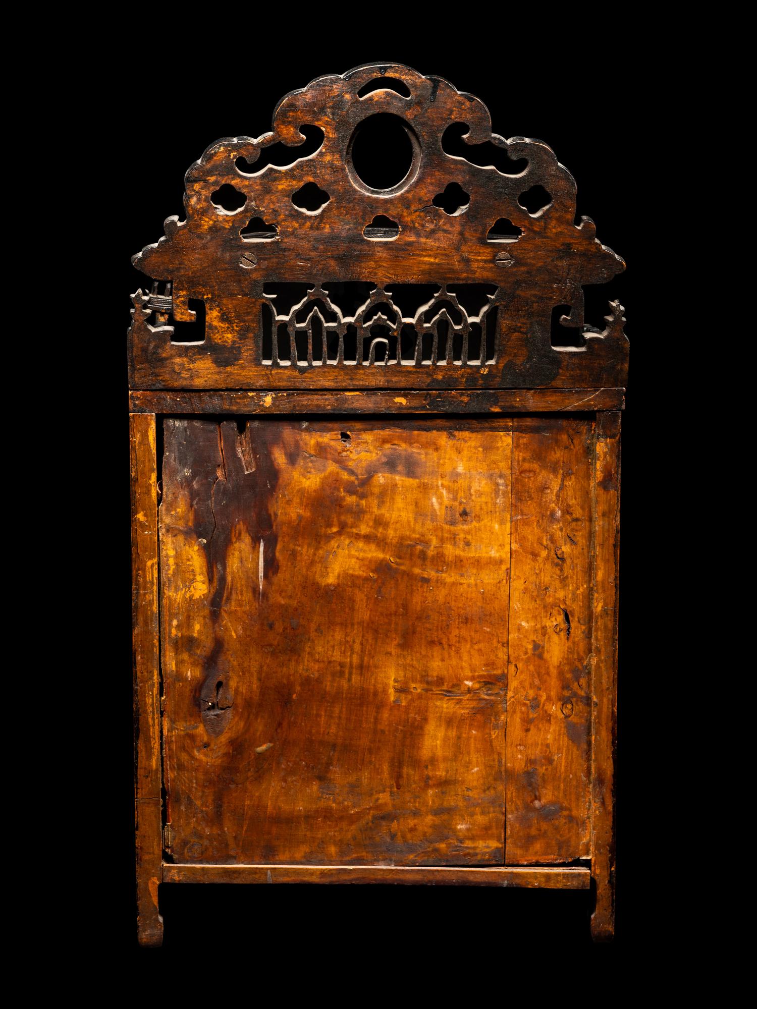 A Chinese Export Carved Hardwood Cabinet