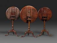 A Chippendale Carved Cherrywood Birdcage-Action Tilt and Dished Top Compressed Ball Tea Table