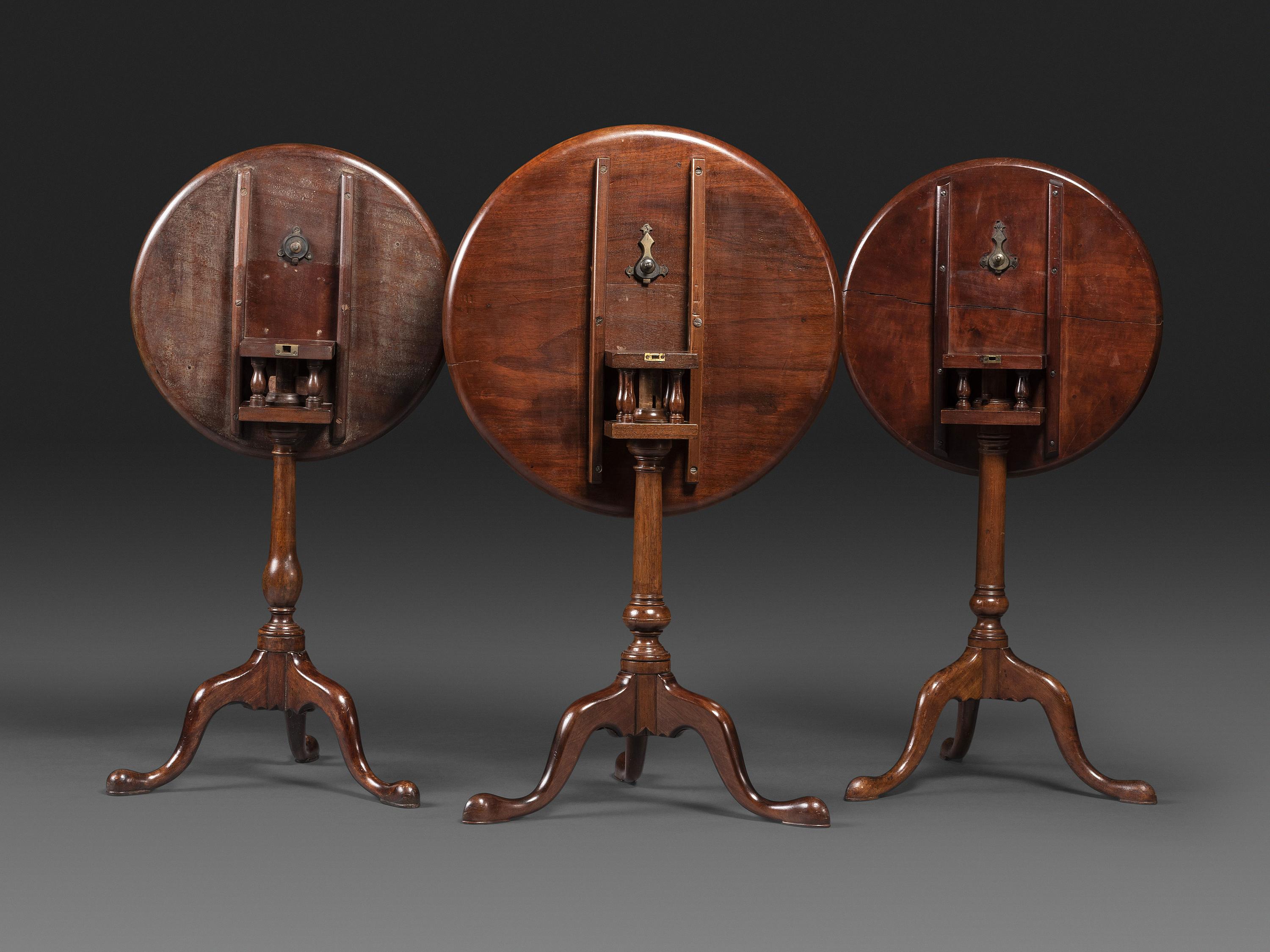 A Chippendale Carved Cherrywood Birdcage-Action Tilt and Dished Top Compressed Ball Tea Table