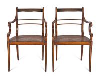 A Pair of Empire Style Mahogany Fauteuils