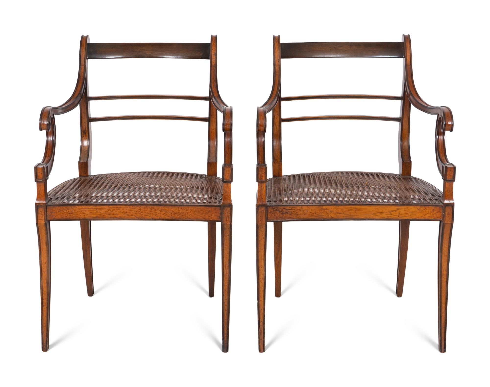 A Pair of Empire Style Mahogany Fauteuils