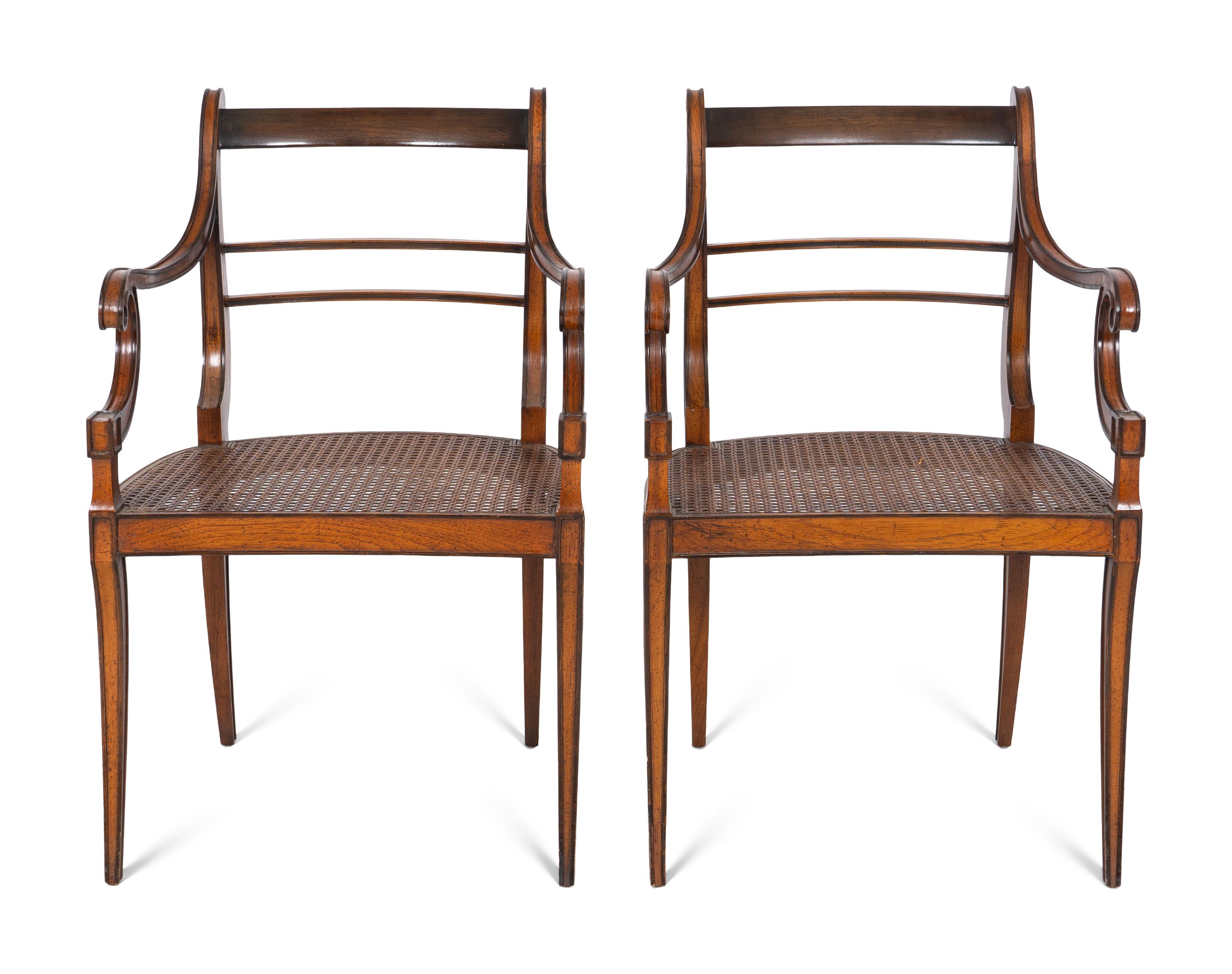 A Pair of Empire Style Mahogany Fauteuils