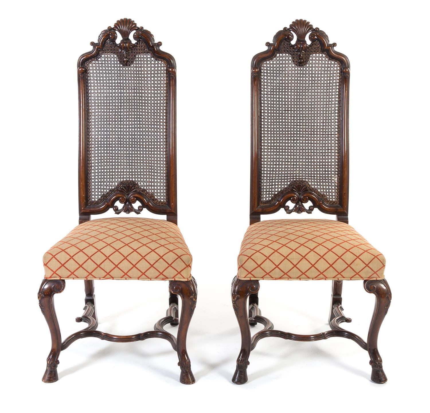 A Pair of Renaissance Revival Walnut Hall Chairs Height 46 1/2 inches. — 20TH CENTURY
