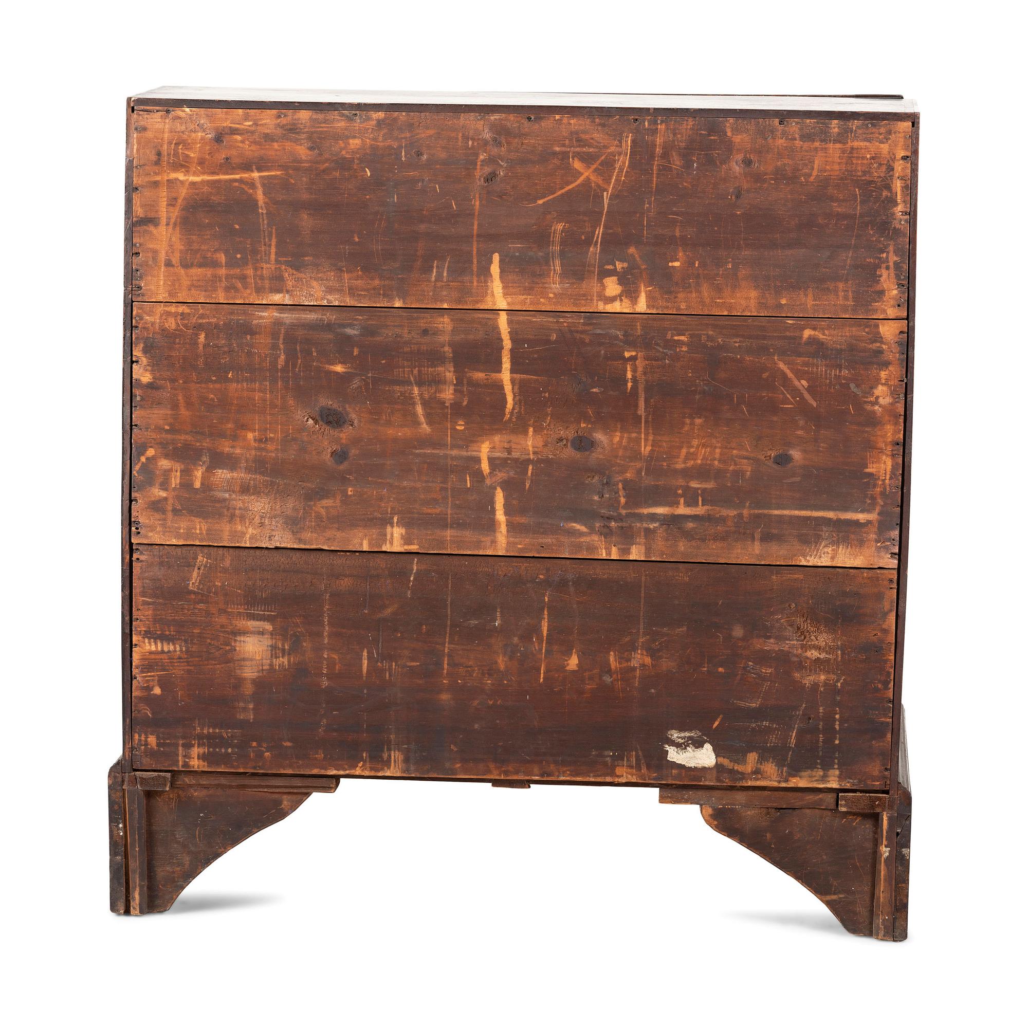 A Chippendale Carved and Figured Mahogany Slant-Front Desk