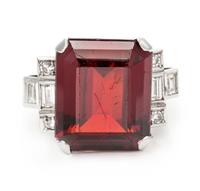 A Platinum, Garnet and Diamond Ring, 9.30 dwts.