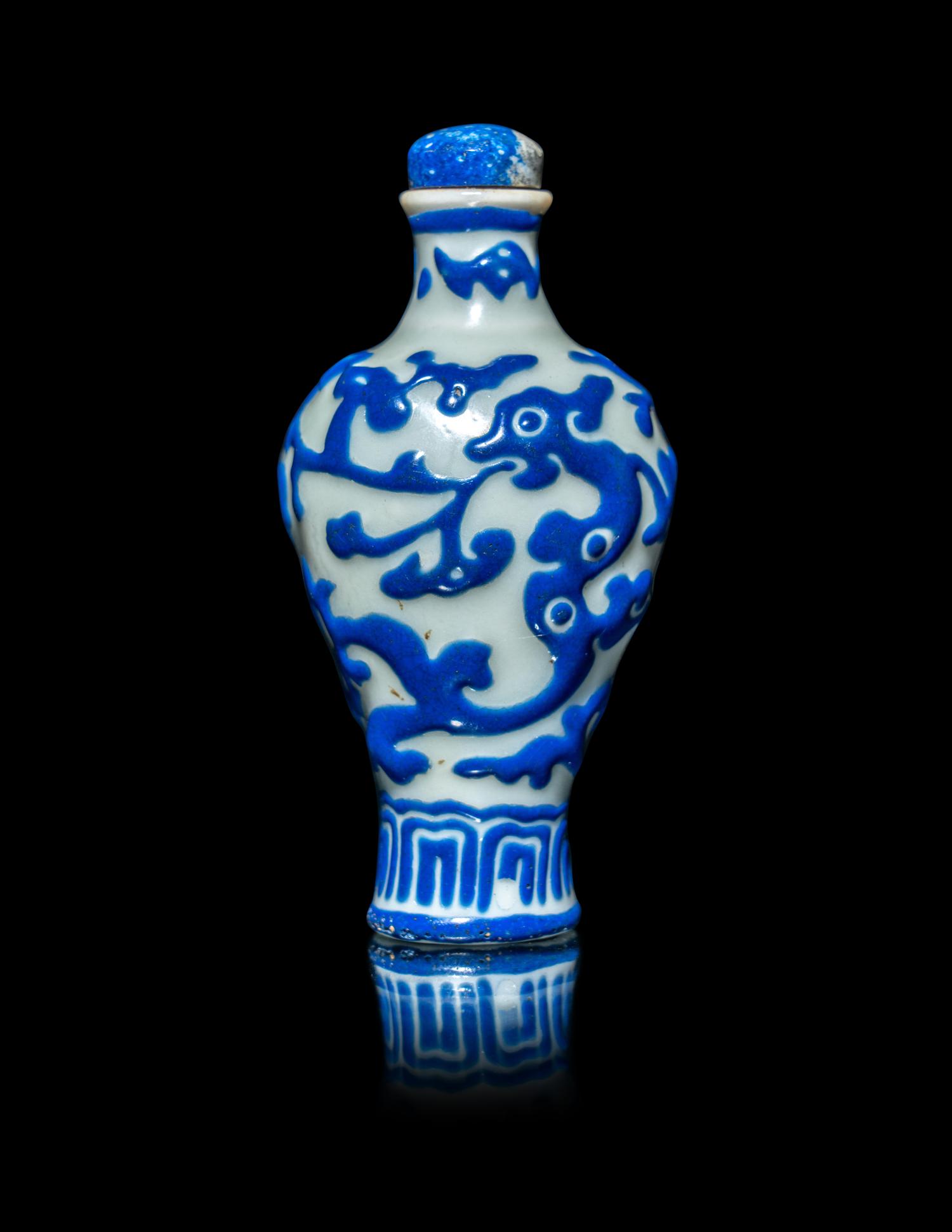 A Chinese Blue and White Enameled Molded Porcelain Snuff Bottle