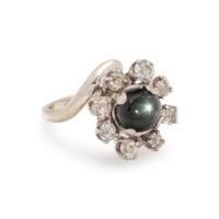BLACK STAR SAPPHIRE AND DIAMOND RING