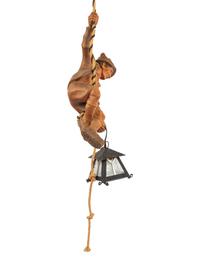 A Black Forest Carved Lindenwood 'Climber' Lamp