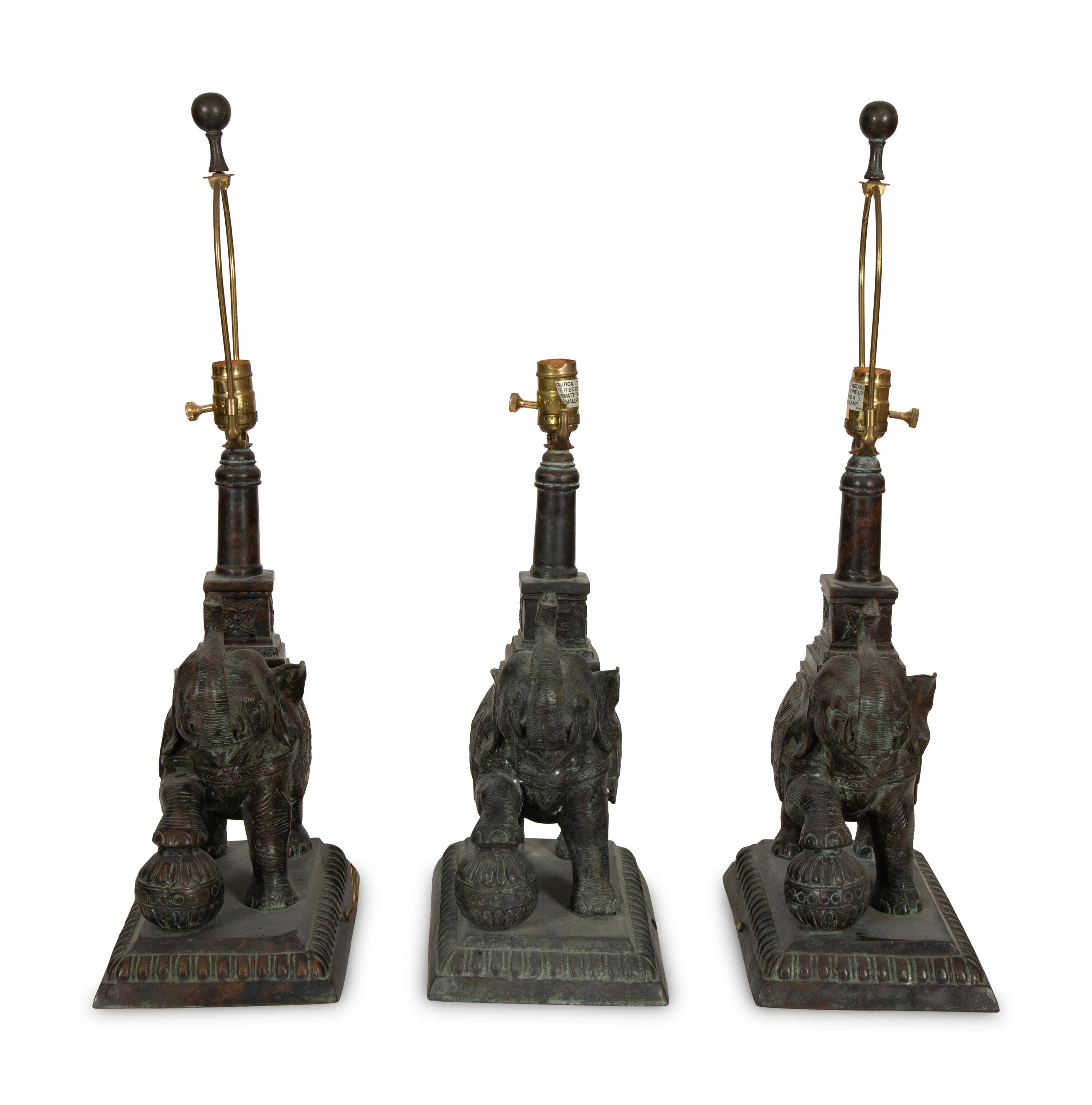 A Set of Three Maitland Smith Cast Metal Elephant-Form Table Lamps