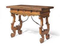 A Spanish Baroque walnut and iron stretcher table, late 17th / 18th century