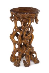 A Carved Mixed Wood Root-Form Stand