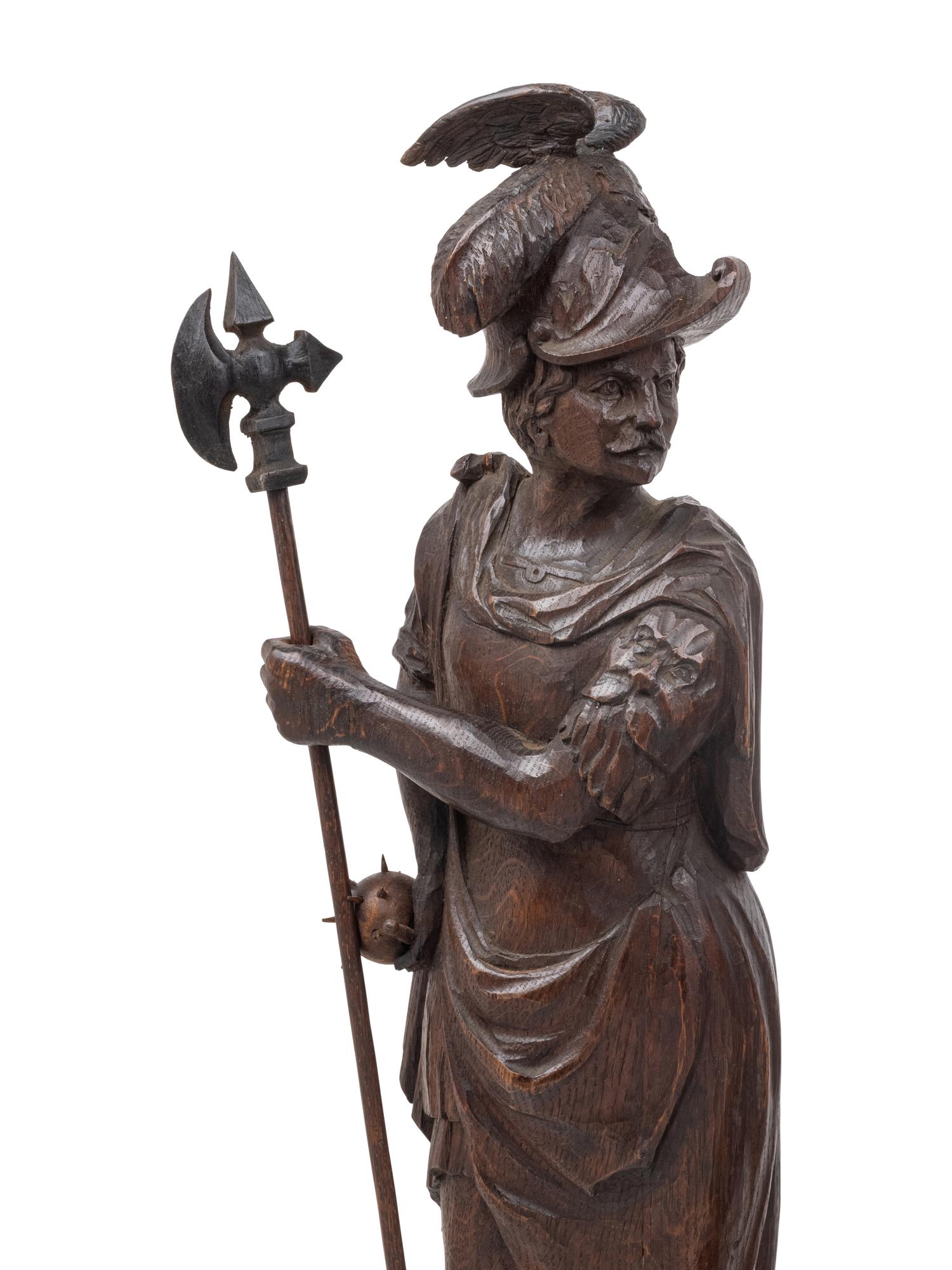 A Pair of Continental Carved Oak Figures of Knights