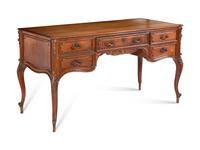 A Louis XV Style Parcel Gilt Oak Bureau Plat