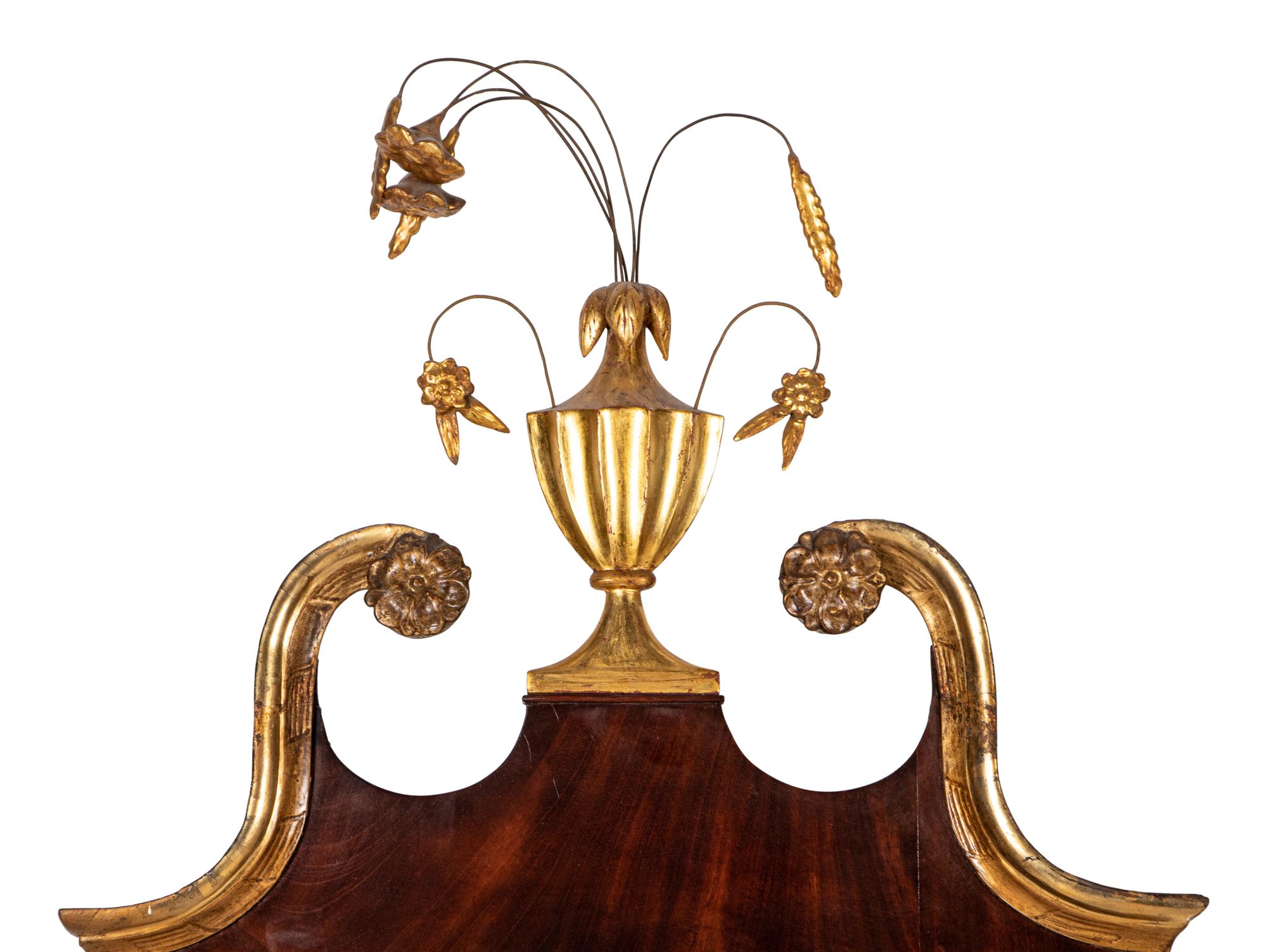 A George III Parcel Gilt Mahogany Mirror