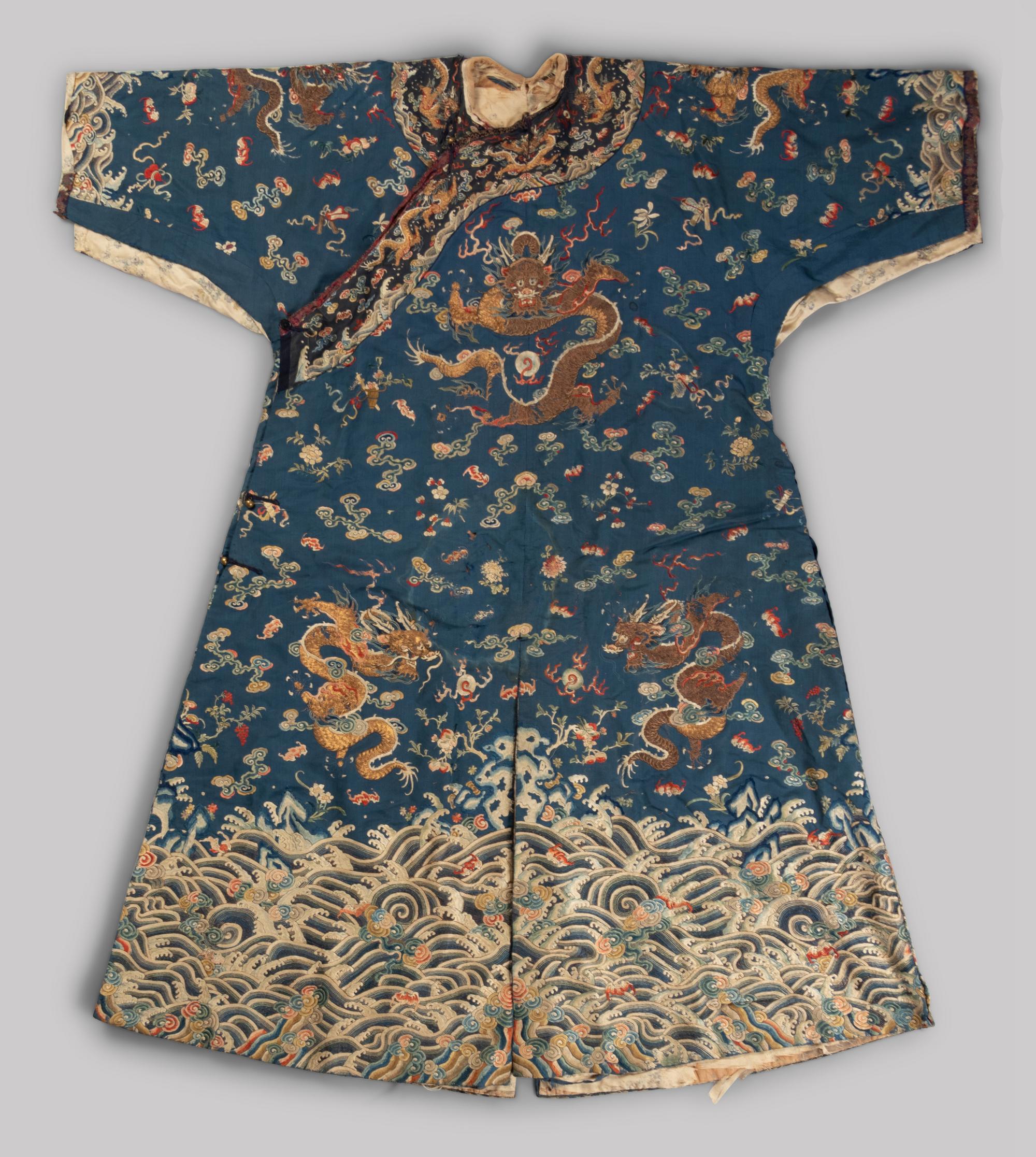A Chinese Blue Ground Embroidered Silk Dragon Robe, Jifu
